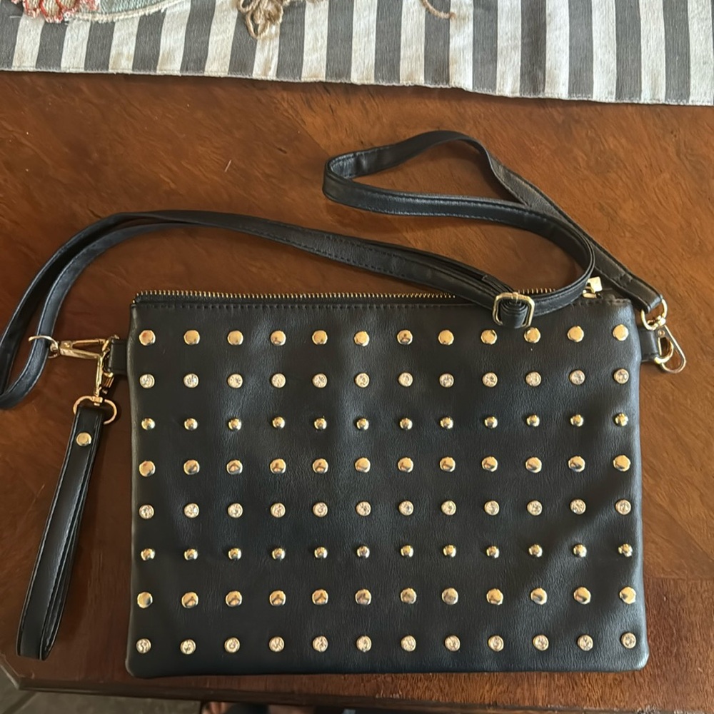 Olivia Miller, Diamond and gold studded purse.